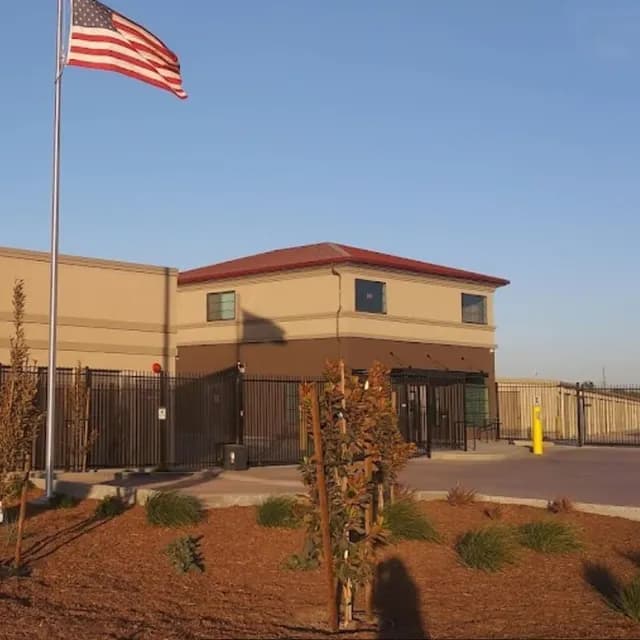 Repositioned Storage Moguls self-storage facility with upgraded office and signage after value-add improvements